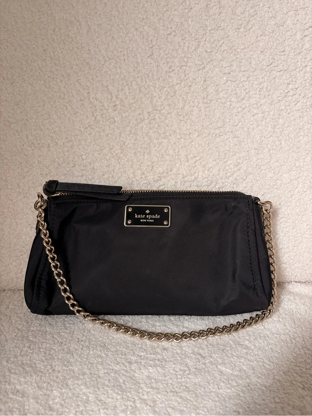 kate spade black nylon wristlet with gold chain strap